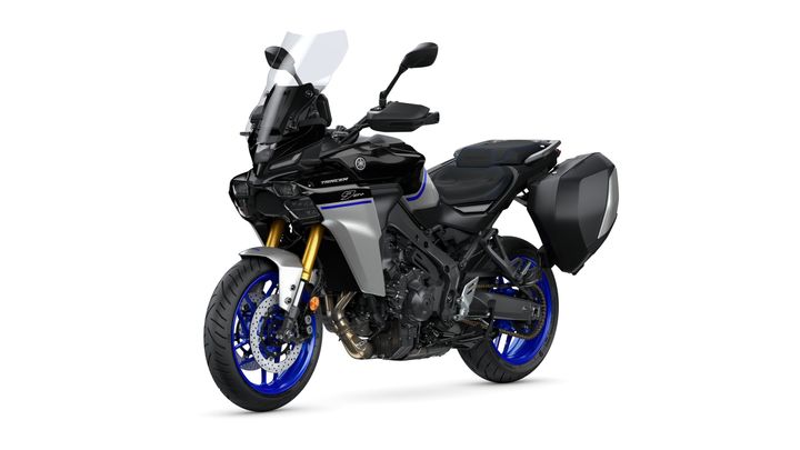A sleek, modern motorcycle with a black and silver body, blue wheel rims, and a windshield. It features a sporty design with a comfortable seat and side panniers for storage, positioned on a white background.