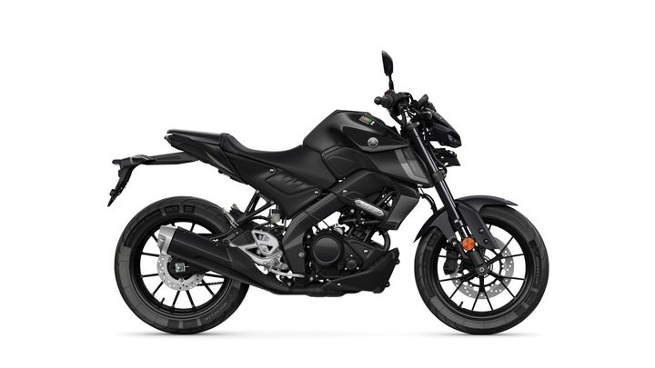 A sleek black motorcycle is displayed from the side, showcasing its modern design, thin profile, and sporty features, including a prominent front fender and dual exhaust.