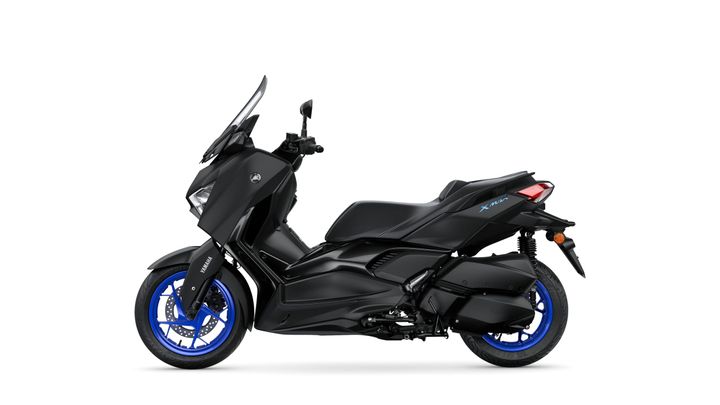 A sleek black Yamaha X-Max scooter with blue alloy wheels, shown from the side on a white background.