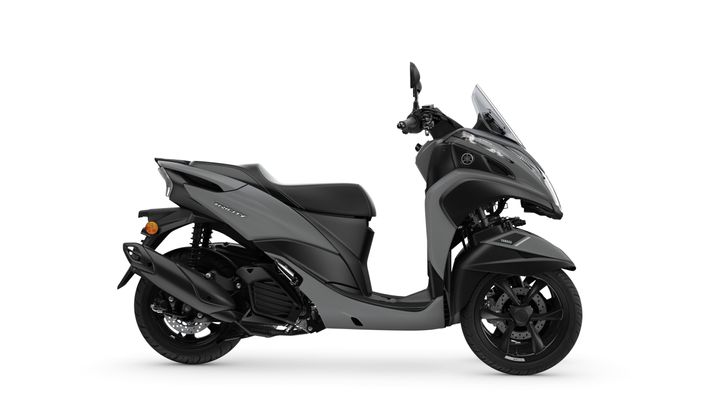 A sleek black and grey scooter with a modern design, featuring a windshield, dual front wheels, and a comfortable seat, displayed against a white background.