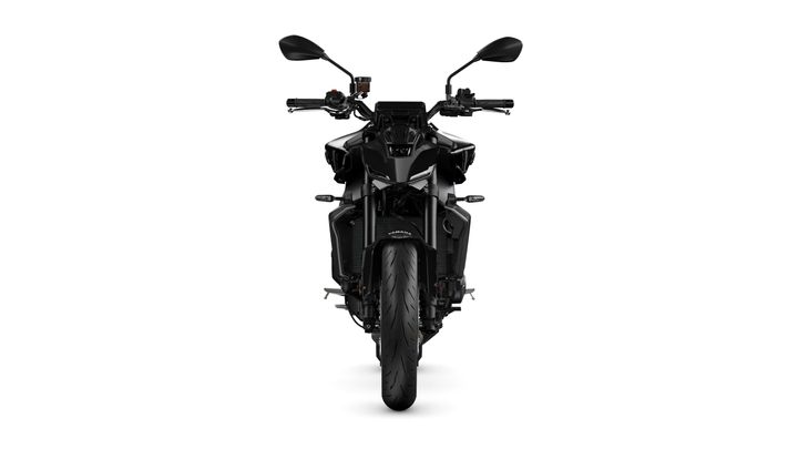 A front view of a sleek, modern black motorcycle with distinctive design features, including sharp lines, dual mirrors, and a wide front tire. The background is plain white, enhancing the motorcycle's visual impact.