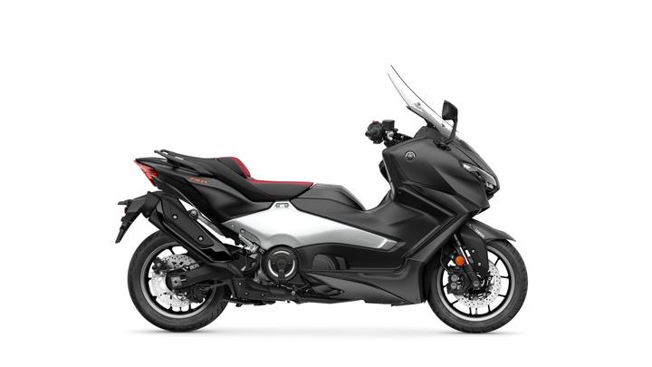 A sleek black and silver scooter with a sporty design, featuring a red accent on the seat and a streamlined body, shown from the side against a white background.