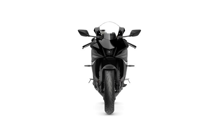 A black motorcycle is shown from the front, featuring sleek lines, a prominent headlight, and distinct handlebars. The background is plain white, emphasizing the motorcycle's design.