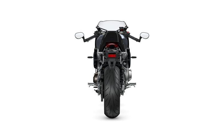 A rear view of a sleek motorcycle with a prominent tire, sleek lines, and mirrors on either side, set against a plain white background.