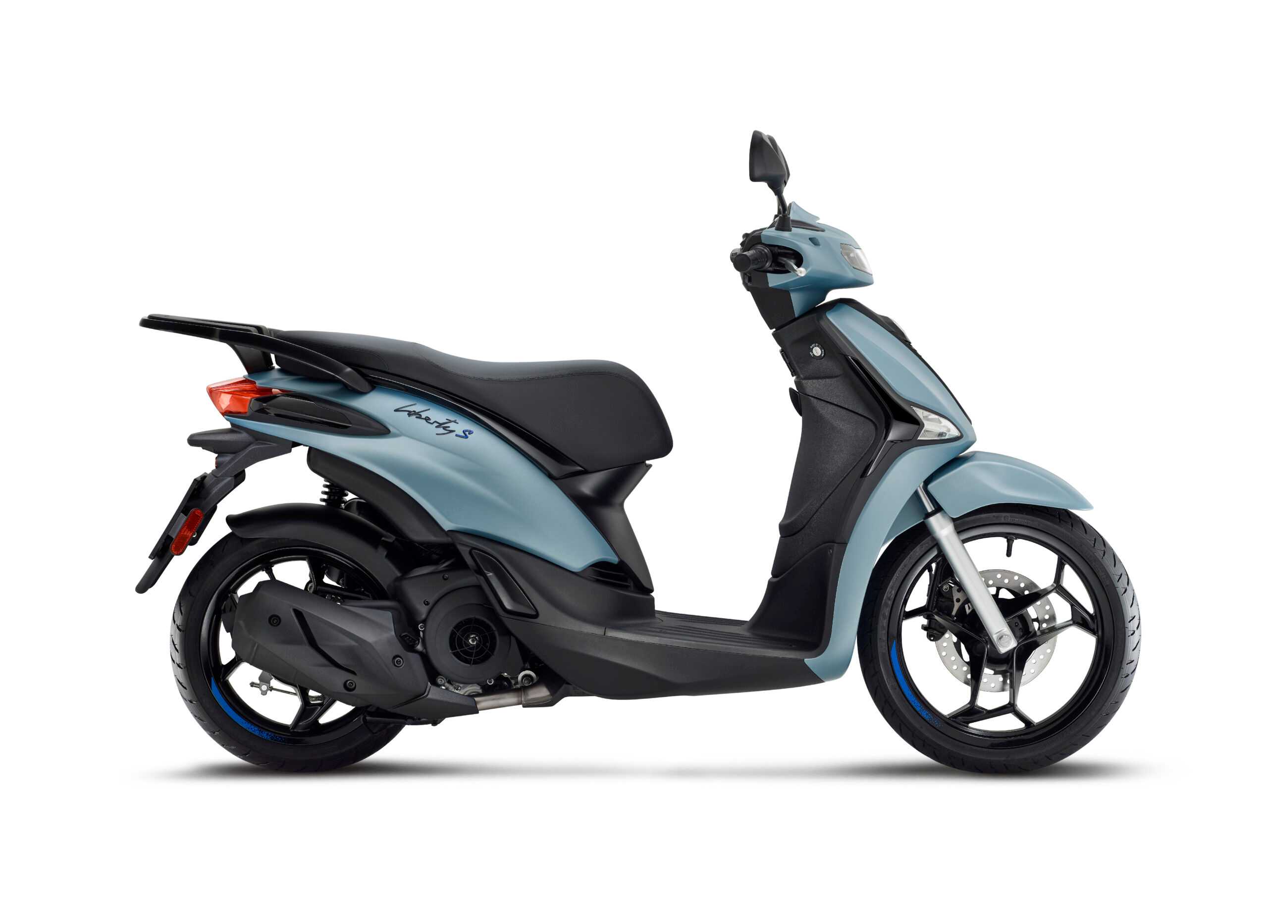 A blue scooter, the Liberty S, is shown in profile, featuring a sleek design, a comfortable seat, and distinctive wheels with blue accents.