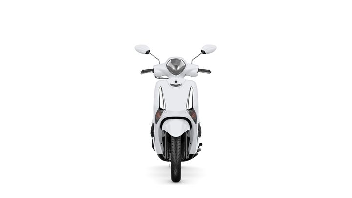 A front view of a sleek, modern white scooter with a streamlined design, featuring a circular headlight and rearview mirrors.