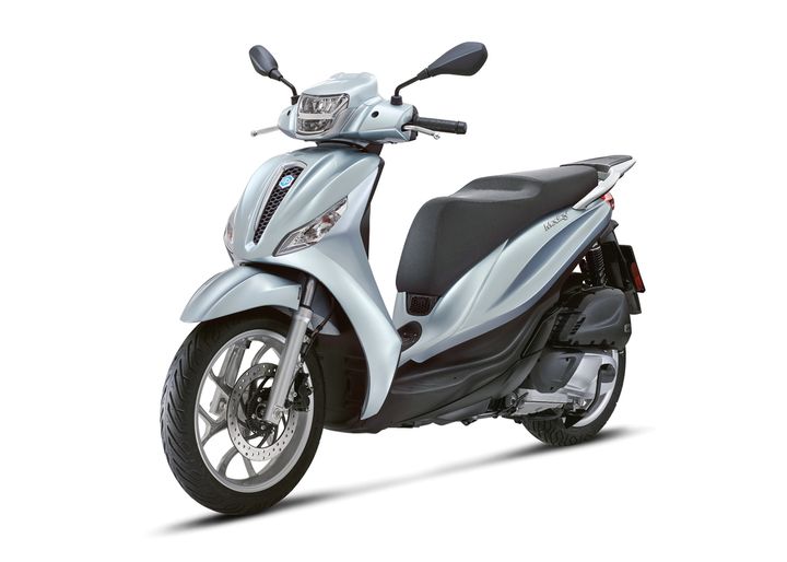 A light blue scooter is shown from the front-left angle, featuring a sleek design with a black seat, chrome accents, and modern headlights.