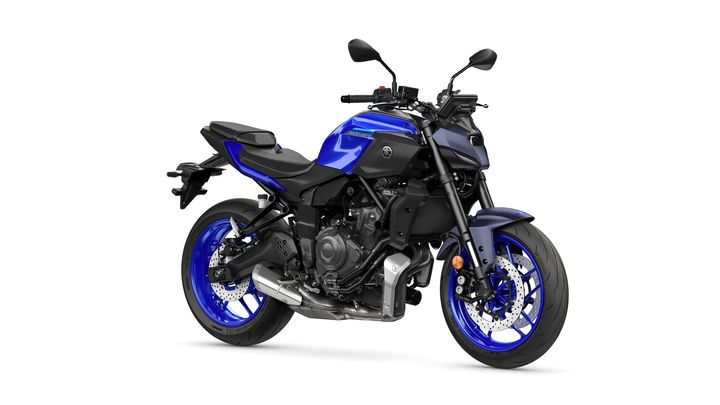 A sleek blue and black Yamaha motorcycle with a modern design, featuring a prominent engine, sporty wheels, and a minimalist seat, positioned against a white background.