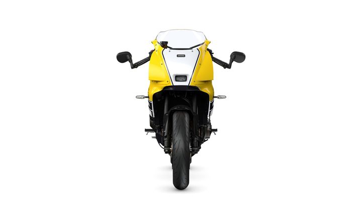 Front view of a sleek yellow motorcycle with black accents, featuring a distinctive fairing and dual mirrors.