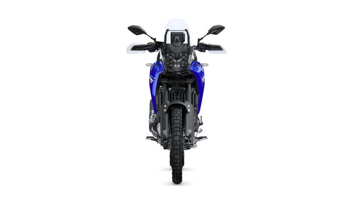 A front view of a blue motorcycle with a rugged design, featuring a large front wheel, prominent headlights, and a protective windshield. The bike is positioned against a white background.
