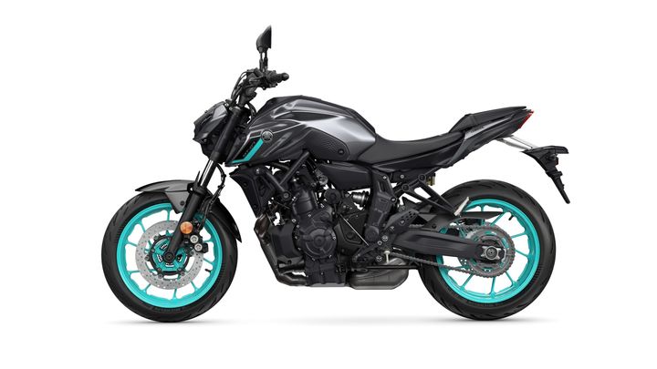 A sleek black motorcycle with teal accents, showcasing modern design elements and a sporty profile.