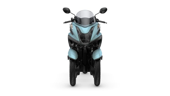 A front view of a modern blue motorcycle with a sporty design, featuring two front wheels, a windshield, and sleek body contours.