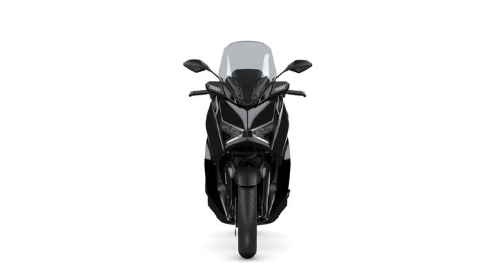 Front view of a sleek black motorcycle with angular headlights and a transparent windscreen against a white background.