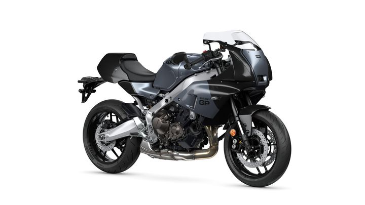 A sleek, modern motorcycle with a matte gray and silver color scheme, featuring a sporty design, a prominent front fairing, and a powerful engine visible in the frame.