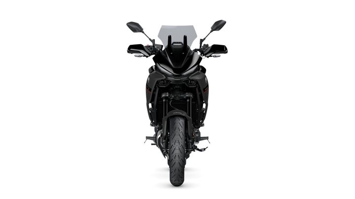Front view of a black motorcycle with a sleek design, featuring a tall windscreen, dual mirrors, and a prominent tire.